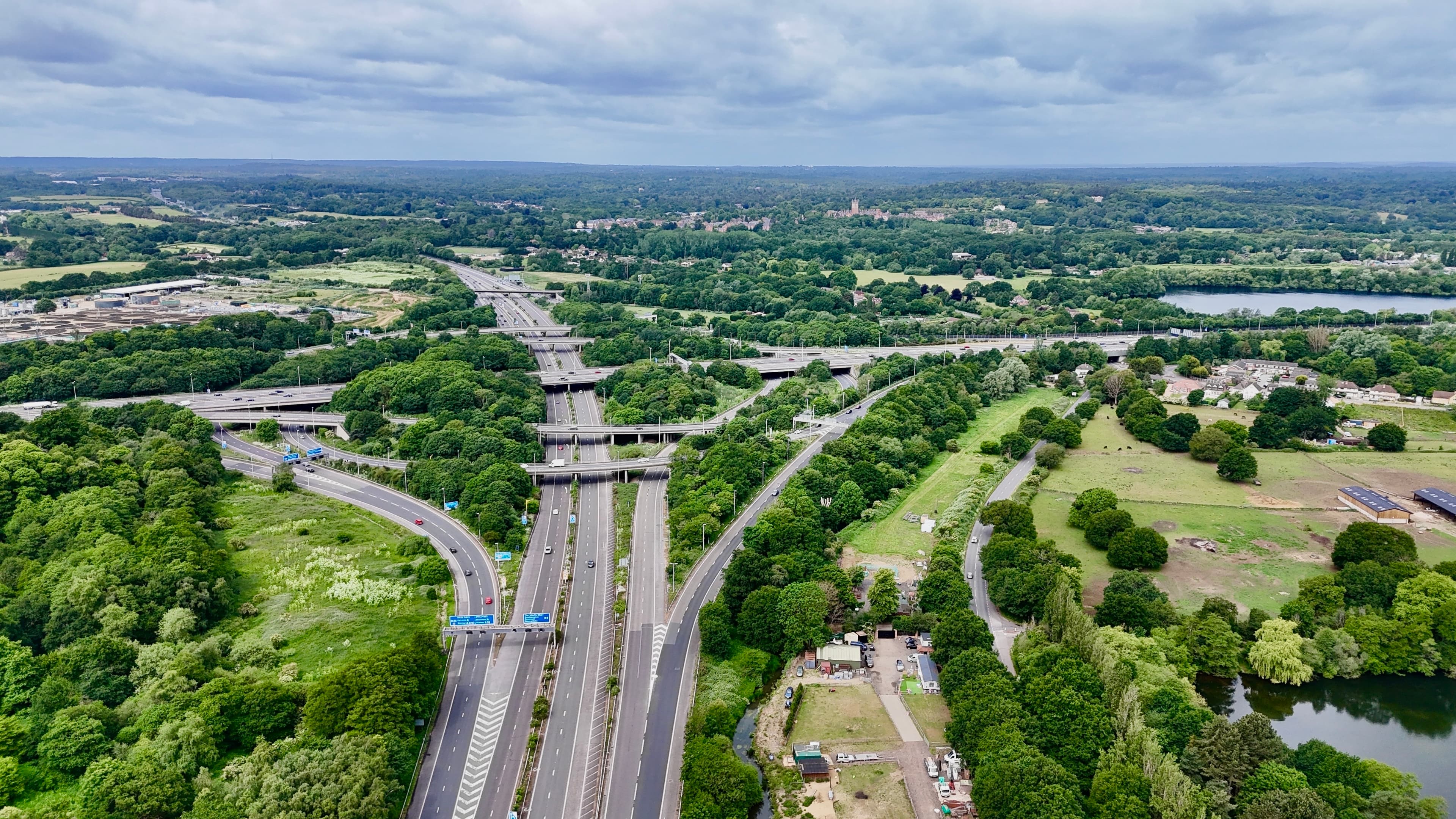 A motorway junction among trees, seen from above