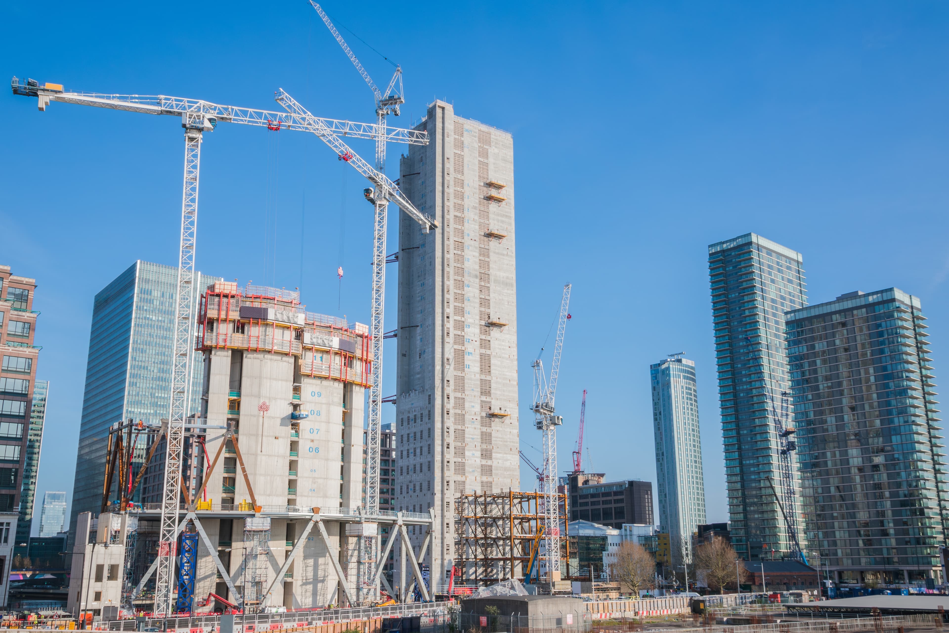 Tower cranes over a building site in Canary Wharf, London