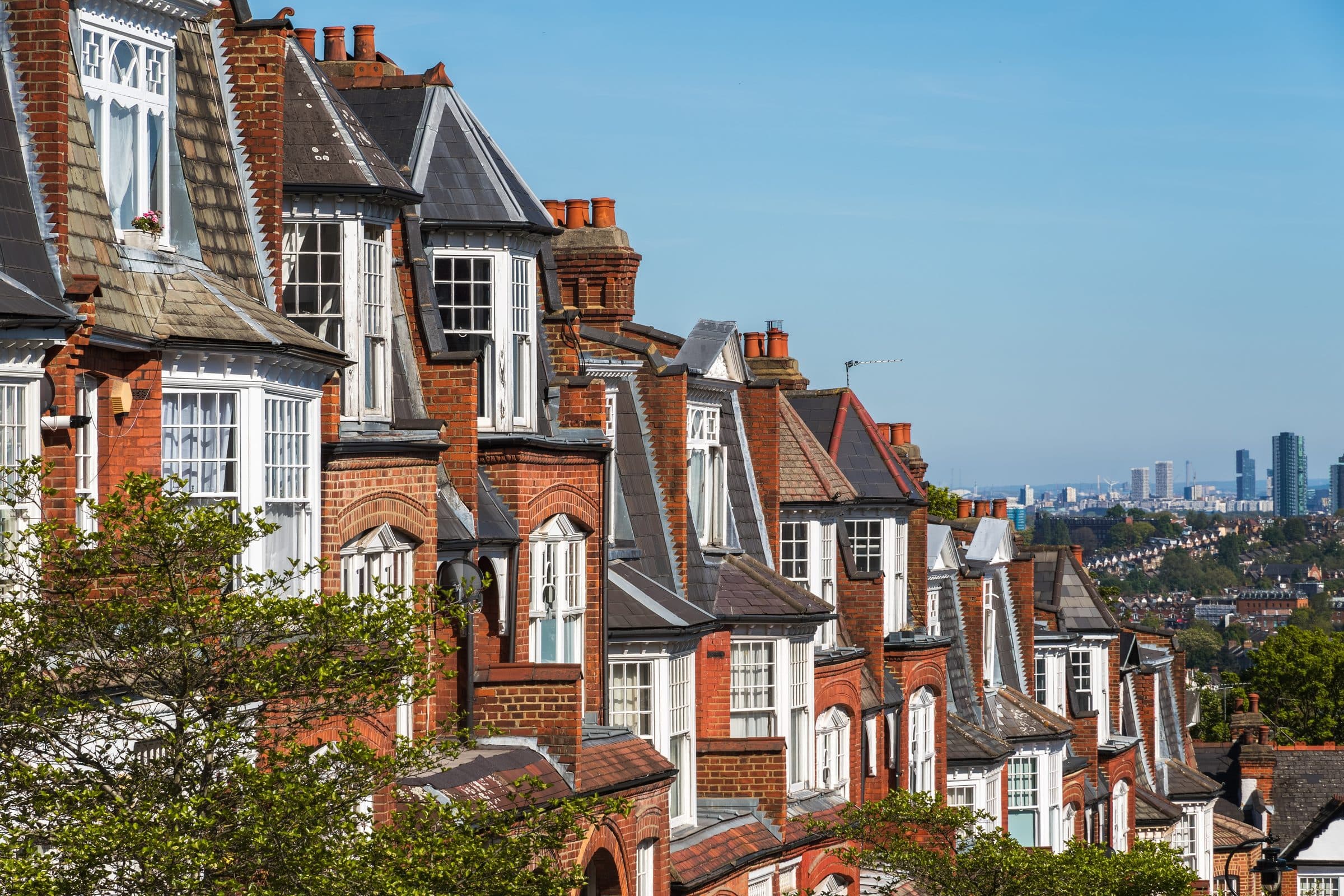 A row of red-brick Victorian houses